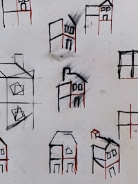 a drawing of a house on a piece of paper